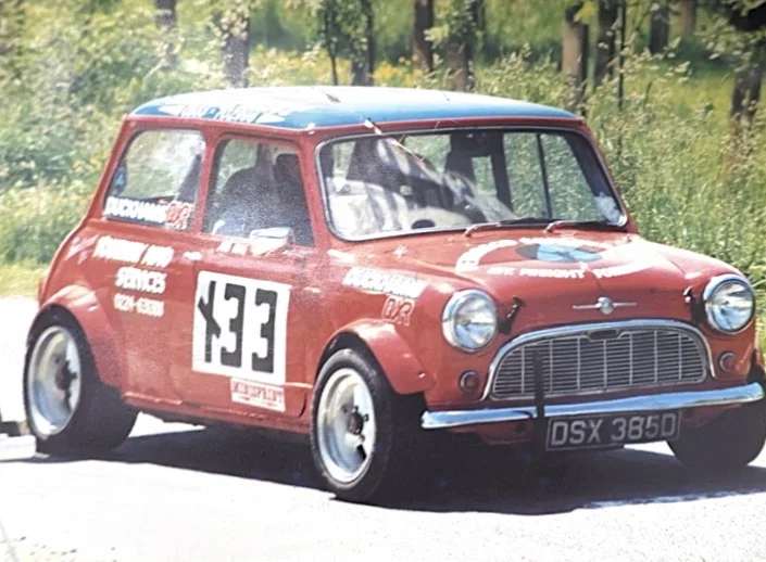 Classic red Mini number 33 in rally trim